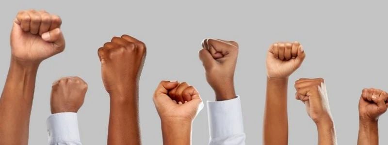 Revolution fists in the air.
