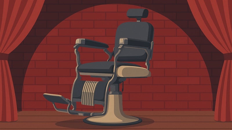An old-fashioned barber chair on stage.