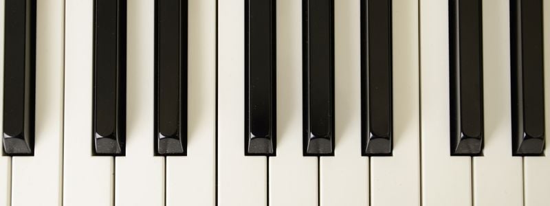 Closeup of piano keys.