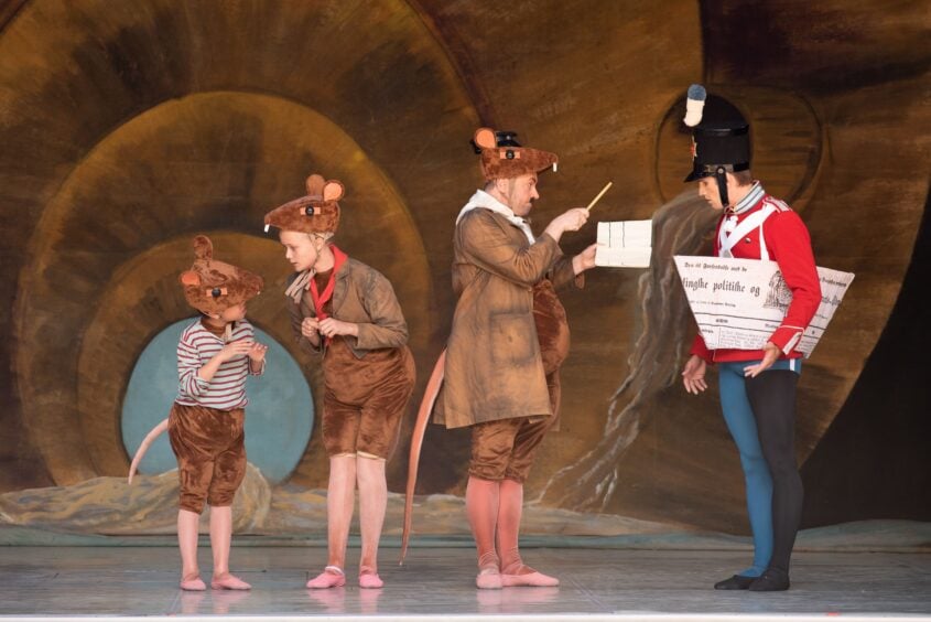 A soldier and three mice. Production still from Tivoli Ballet Theatre.