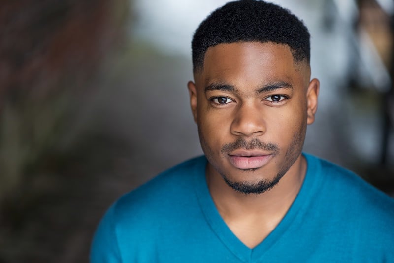 Headshot of CJ Stewart.