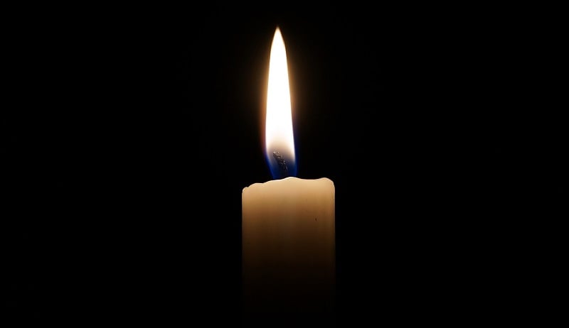 A lit candle.