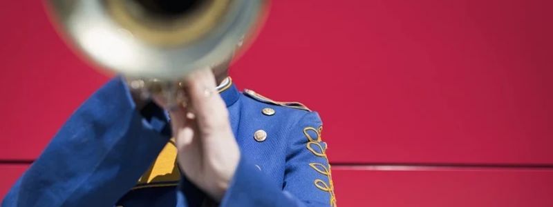 A band member playing an instrument.