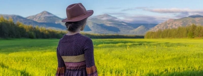A woman looking at the hills.