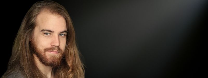 A headshot of Matt Cox.
