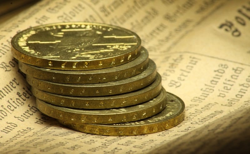 A stack of gold coins.