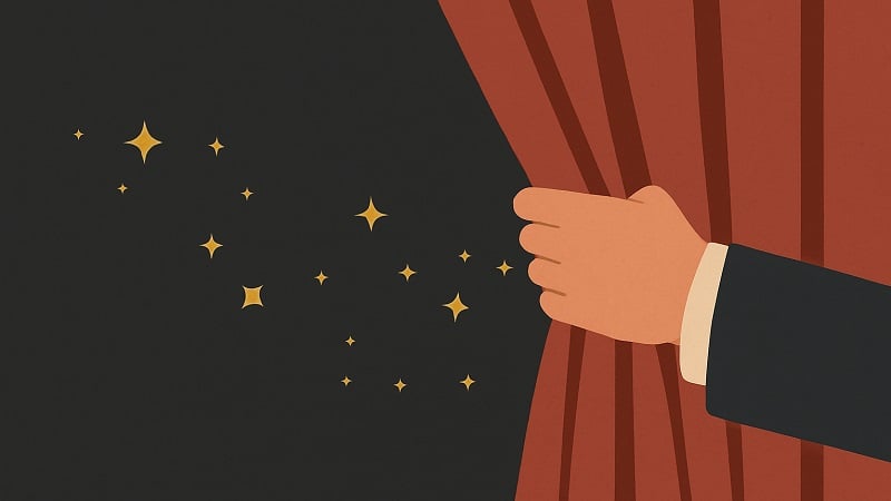 A hand pulling back a curtain with sparkles.