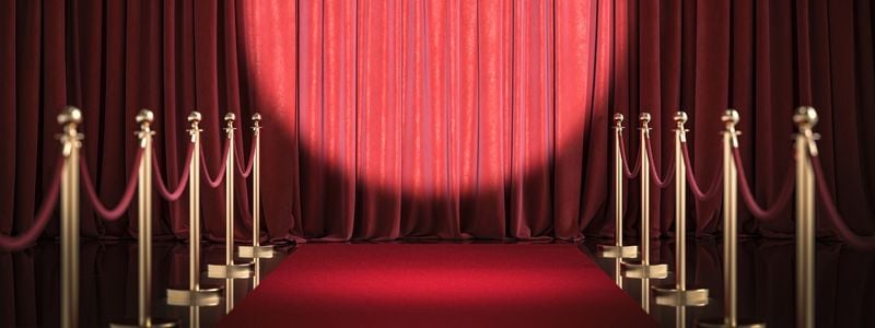 A spotlight on a red stage.