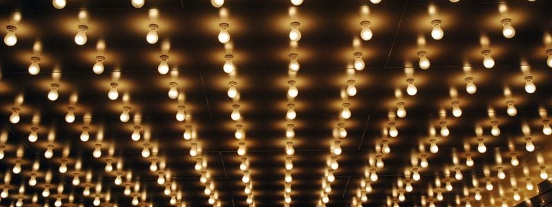 A closeup of Broadway style lights.