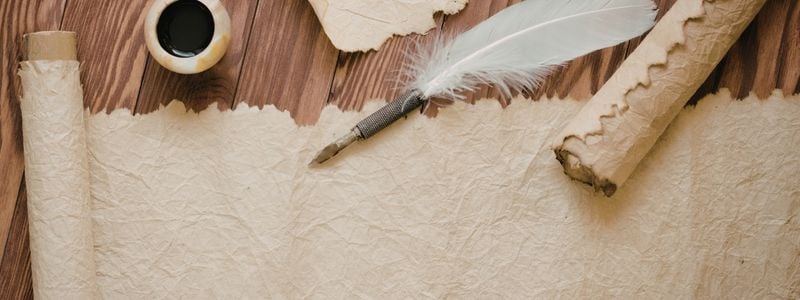 A blank parchment and a pen.