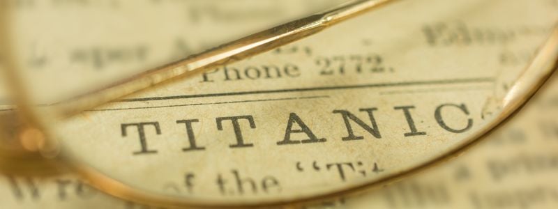 "Titanic" printed on an old newspaper.