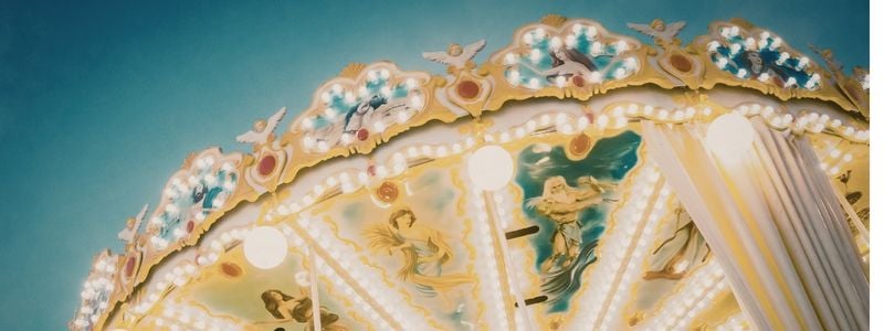 The top of a vintage carousel.