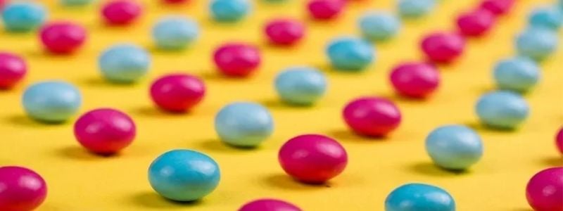 Rows of colorful candy drops.