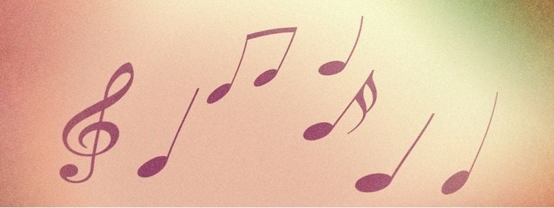 Pastel pink and green music notes.