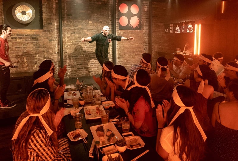 A man introducing Batsu in NYC.
