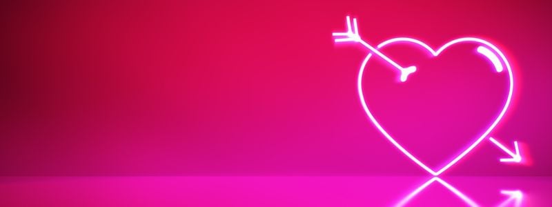 A neon heart with an arrow through it.