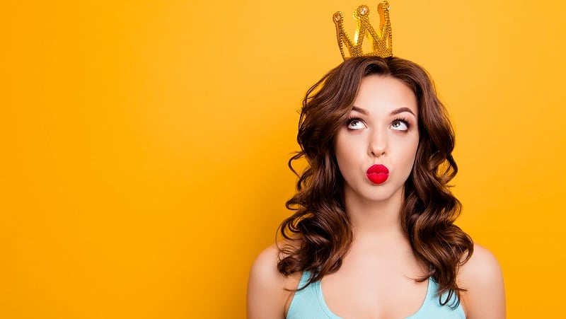 A woman wearing a princess crown.