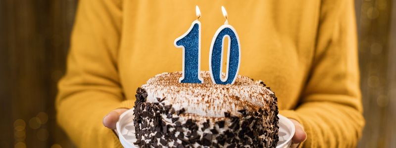 "10" candles on a cake.
