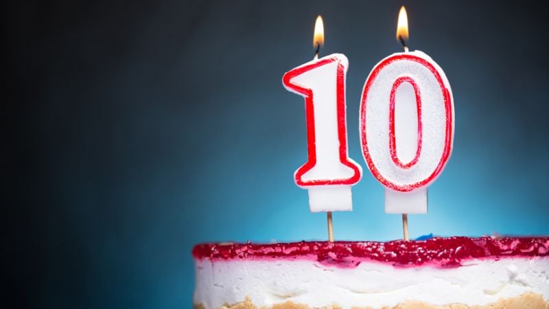"10" candles on a cake.