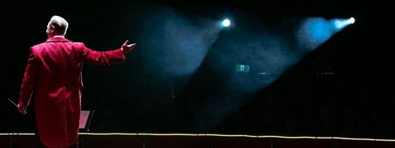 A side show ringmaster.