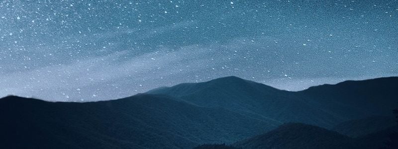 Mountains and a starry sky.