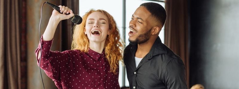 Two performers singing a duet.