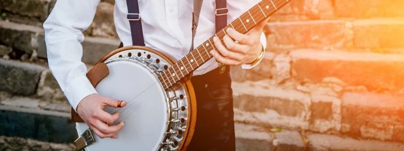 A man playing the banjo.