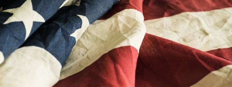 Closeup of an old American flag.