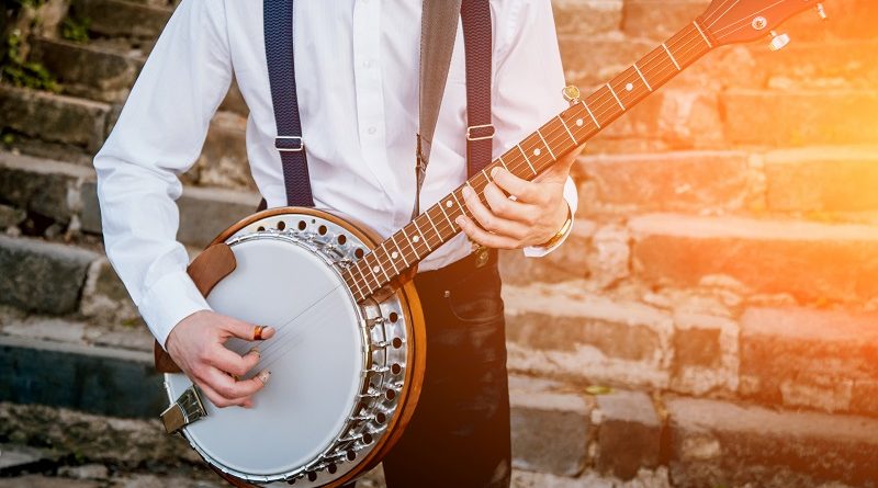 A man playing the banjo.