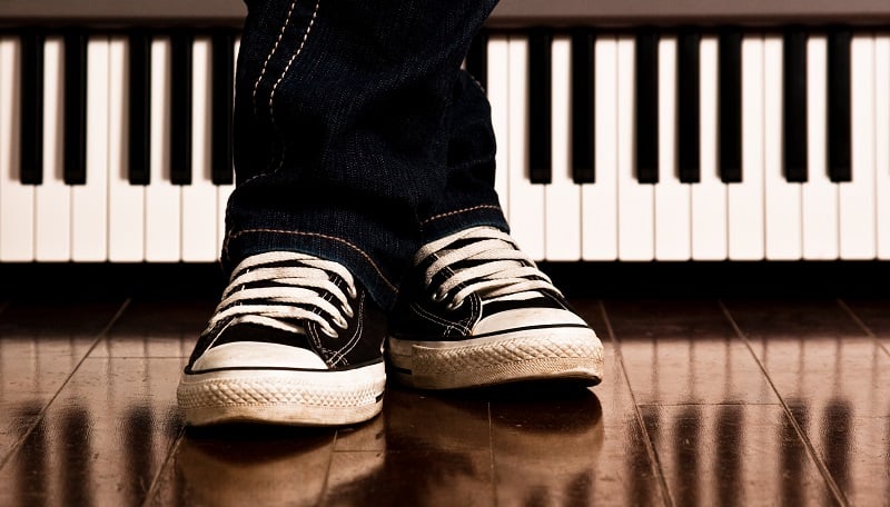 Sneakers at the piano.