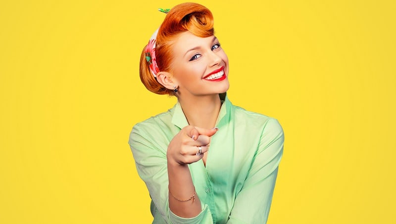 A smiling 1950s woman.