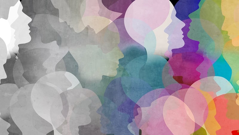 Abstract heads changing from greyscale to color.