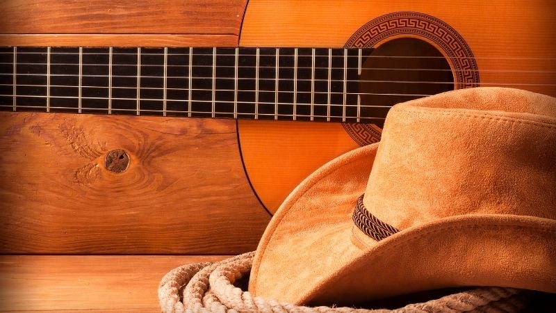 A guitar and cowboy hat.