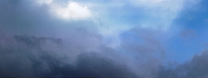 A foggy blue sky.