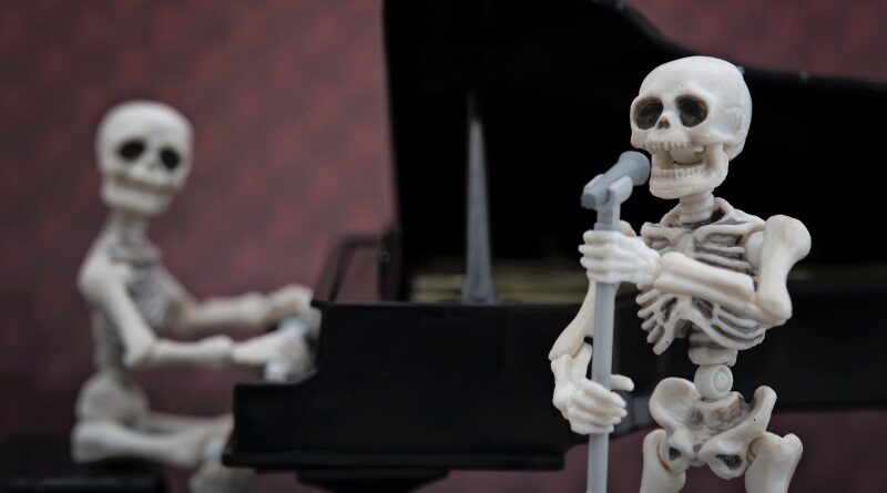 Two skeletons singing.