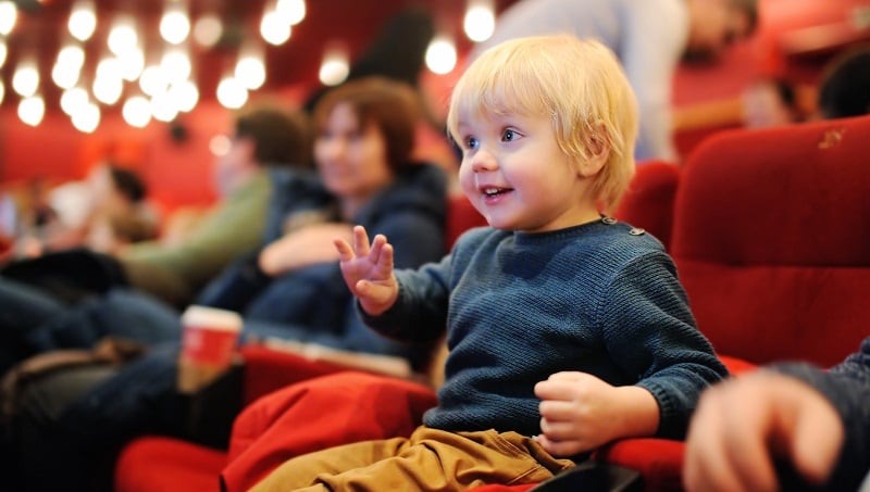 A child enjoying a musical.