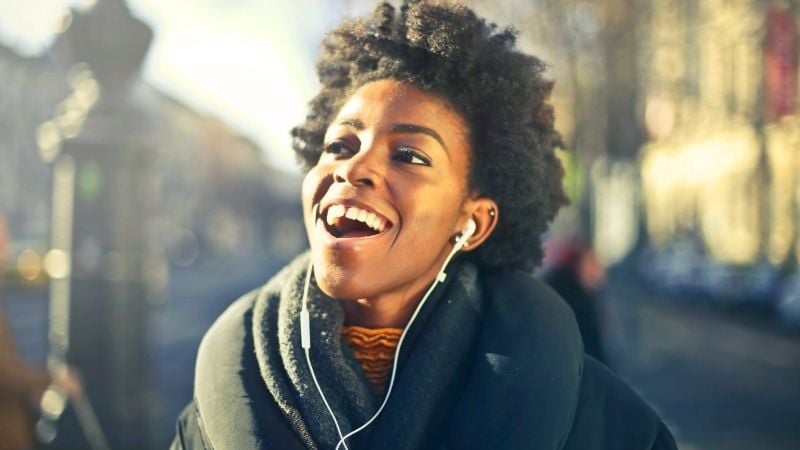 A woman listening to new music.