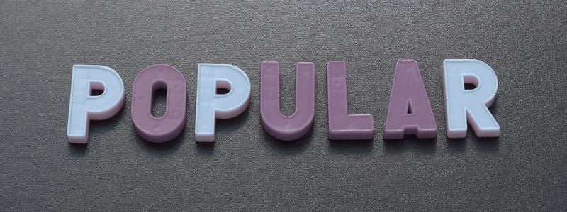 The word "popular" spelled out with block letters.