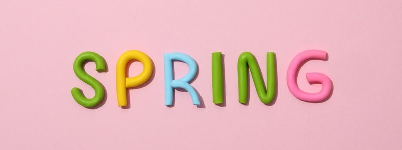 The word "Spring" spelled with pastel clay.