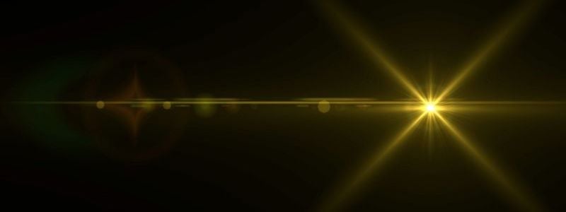 A yellow spark in the darkness.