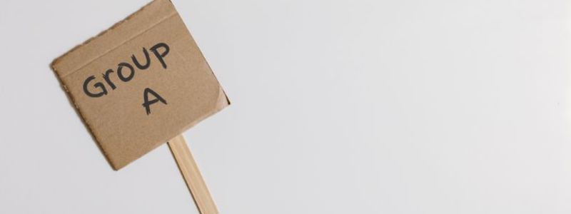 A cardboard "Group A" sign.