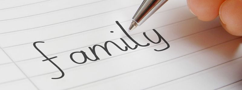 "family" written on a piece of paper.