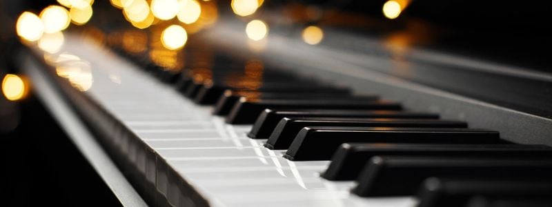 Piano keys with twinkle lights.