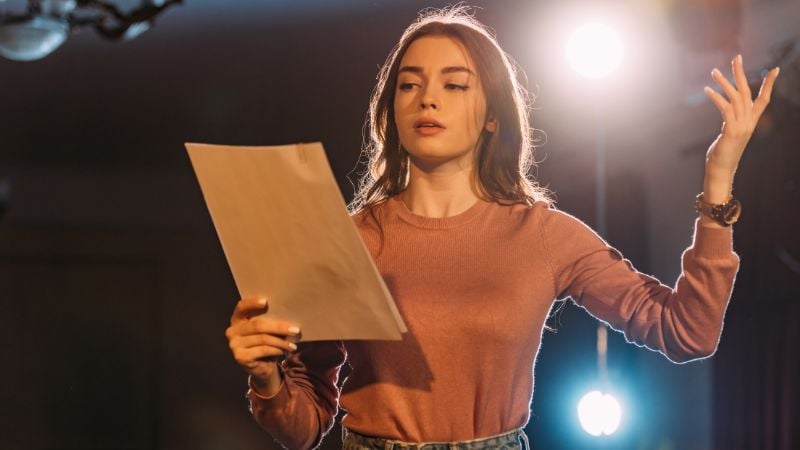 A female lead in rehearsal.