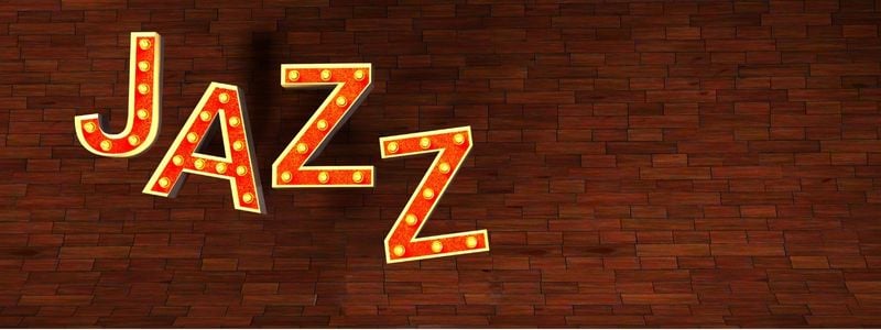The word "JAZZ" written with stage lights.