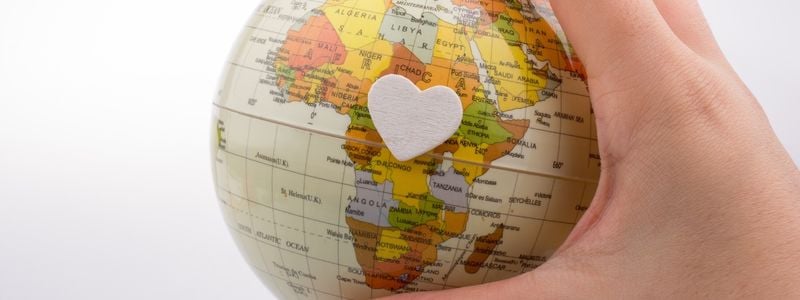 The globe with a heart on top of Africa.