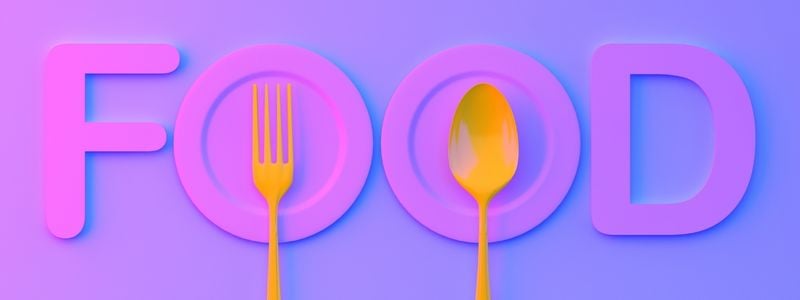The word "Food" written in neon with two plates as "O"s.