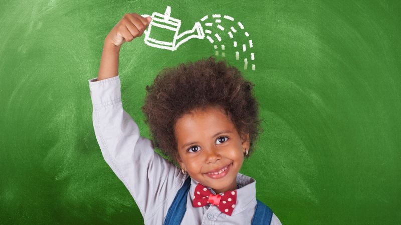 A growing child with a chalk "watering can".