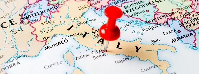 A map with a pin in Italy.