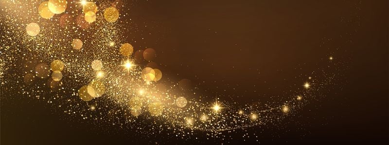 Gold sparkles on a red background.